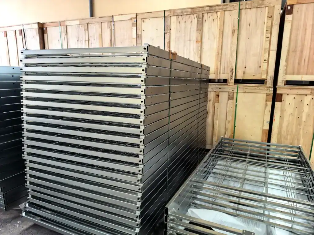 Finished custom fabricated metal frame assemblies stacked for delivery