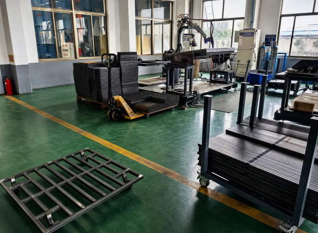 Custom metal parts batch production in workshop